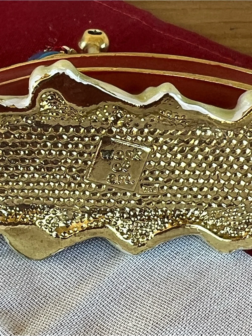 Work of Art gold tone